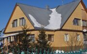 Жилой дом в п.Таскино Красноярского края (материал фиброцементная панель Роспан)